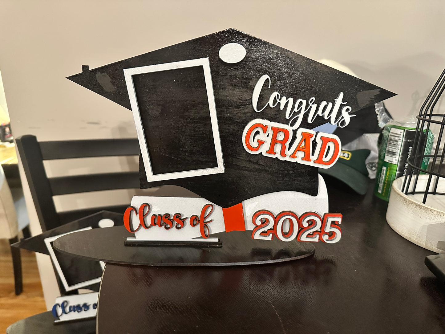 Graduation tassel holder with picture frame